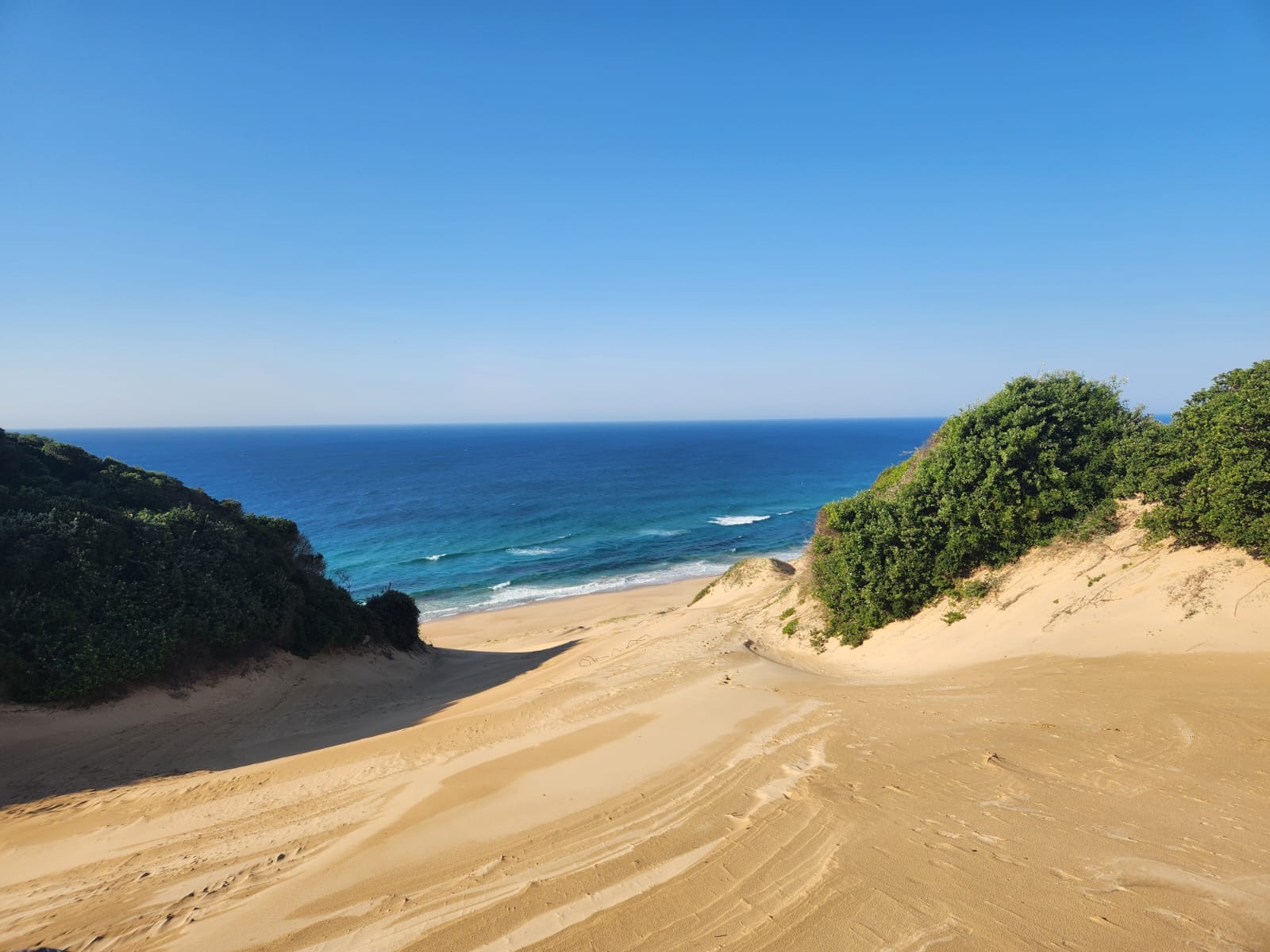 Untouched dunes and turquoise sea at Sodwana Bay