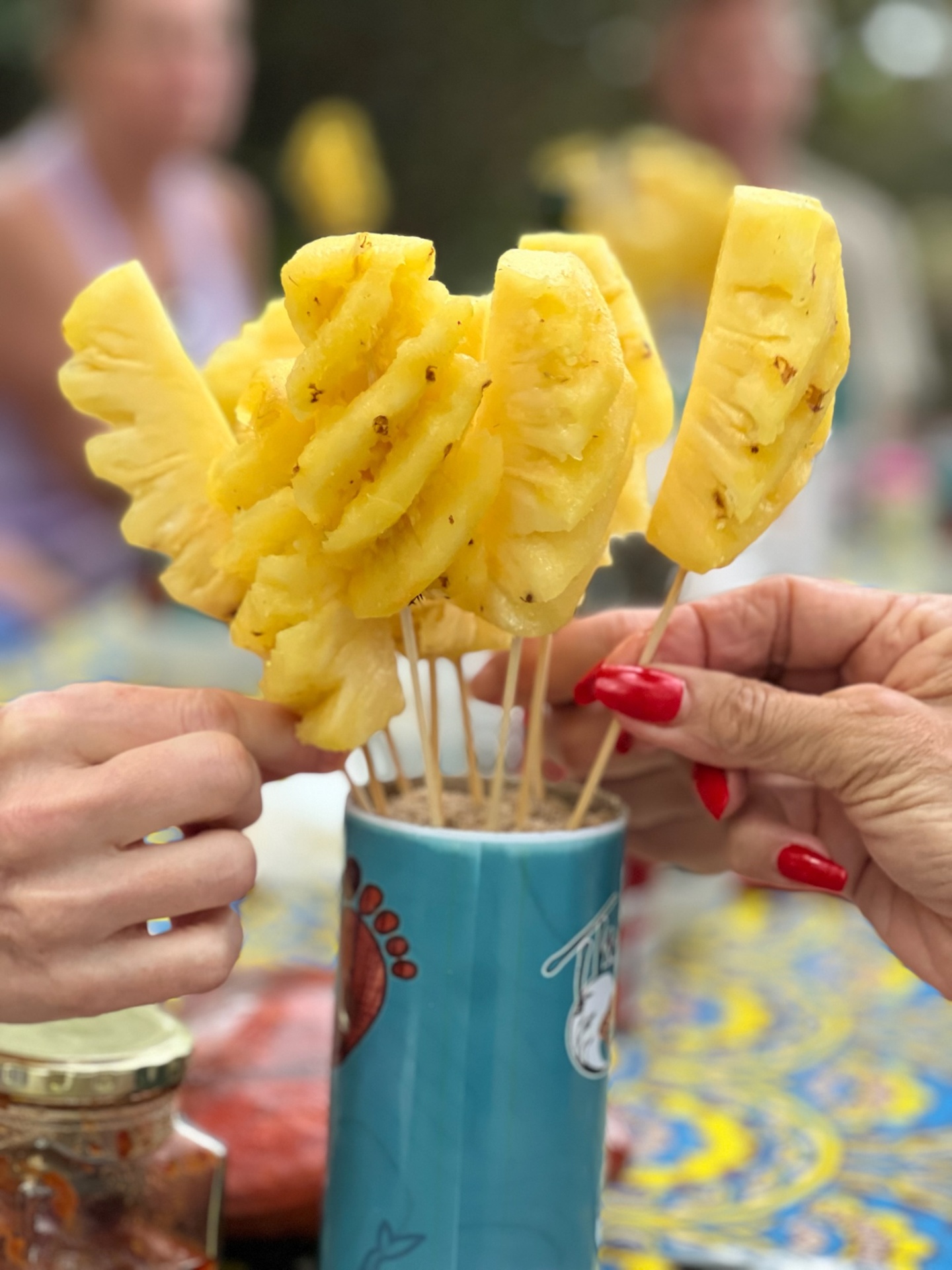 Grilled pineapple skewers in a Thonga Trails mug